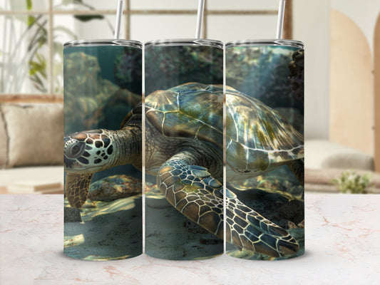 Sea turtle swimming underwater on a cylindrical tumbler mockup.
