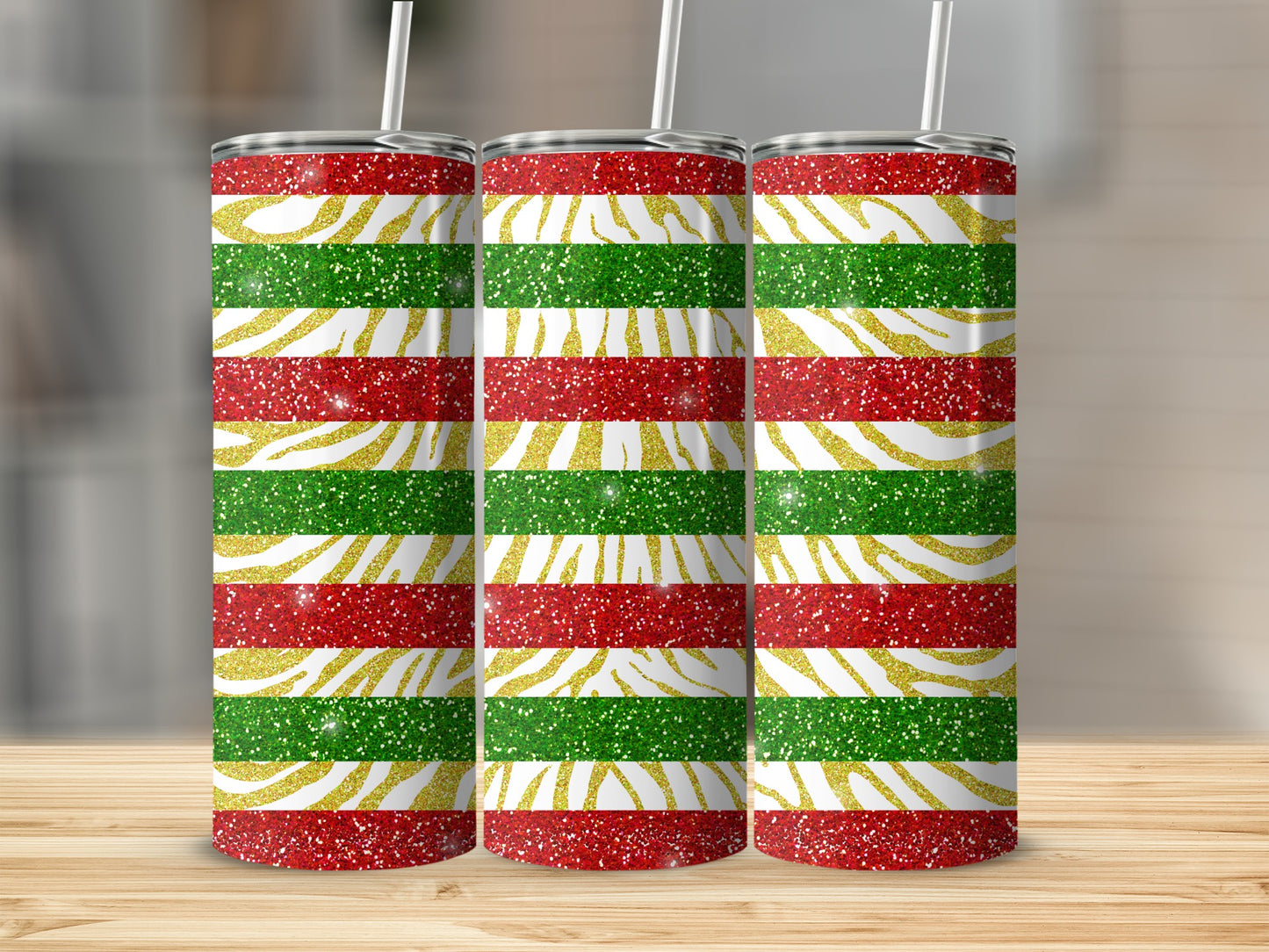 Three tumblers with red, green, and gold glitter stripe pattern.
