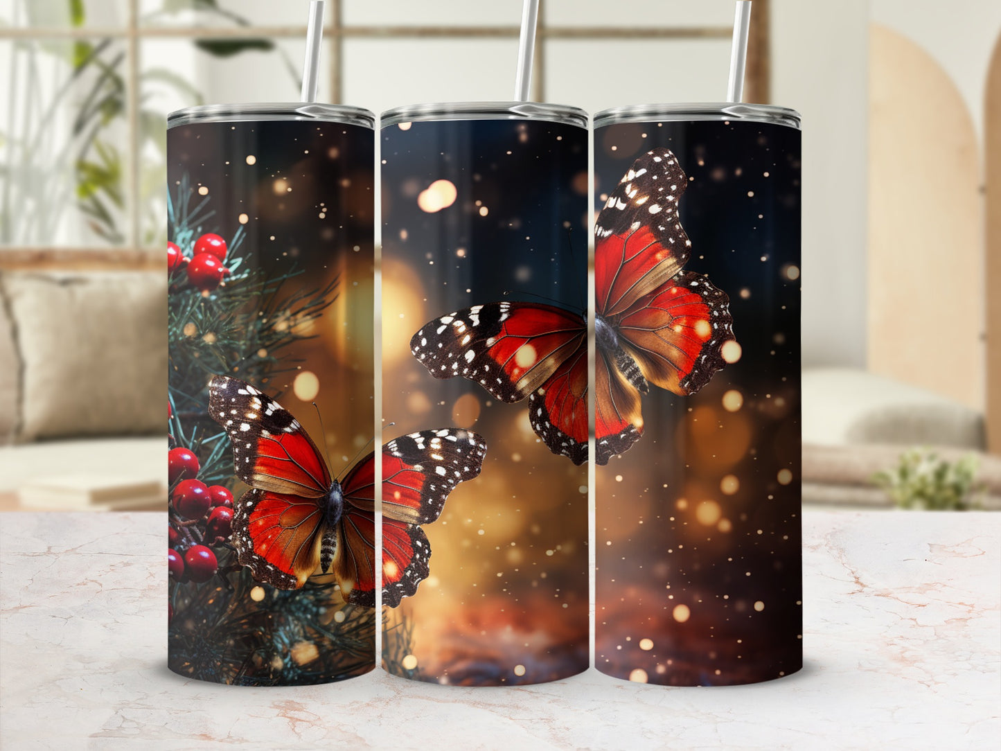 Three tumblers with red and black butterfly designs, with soft bokeh background.