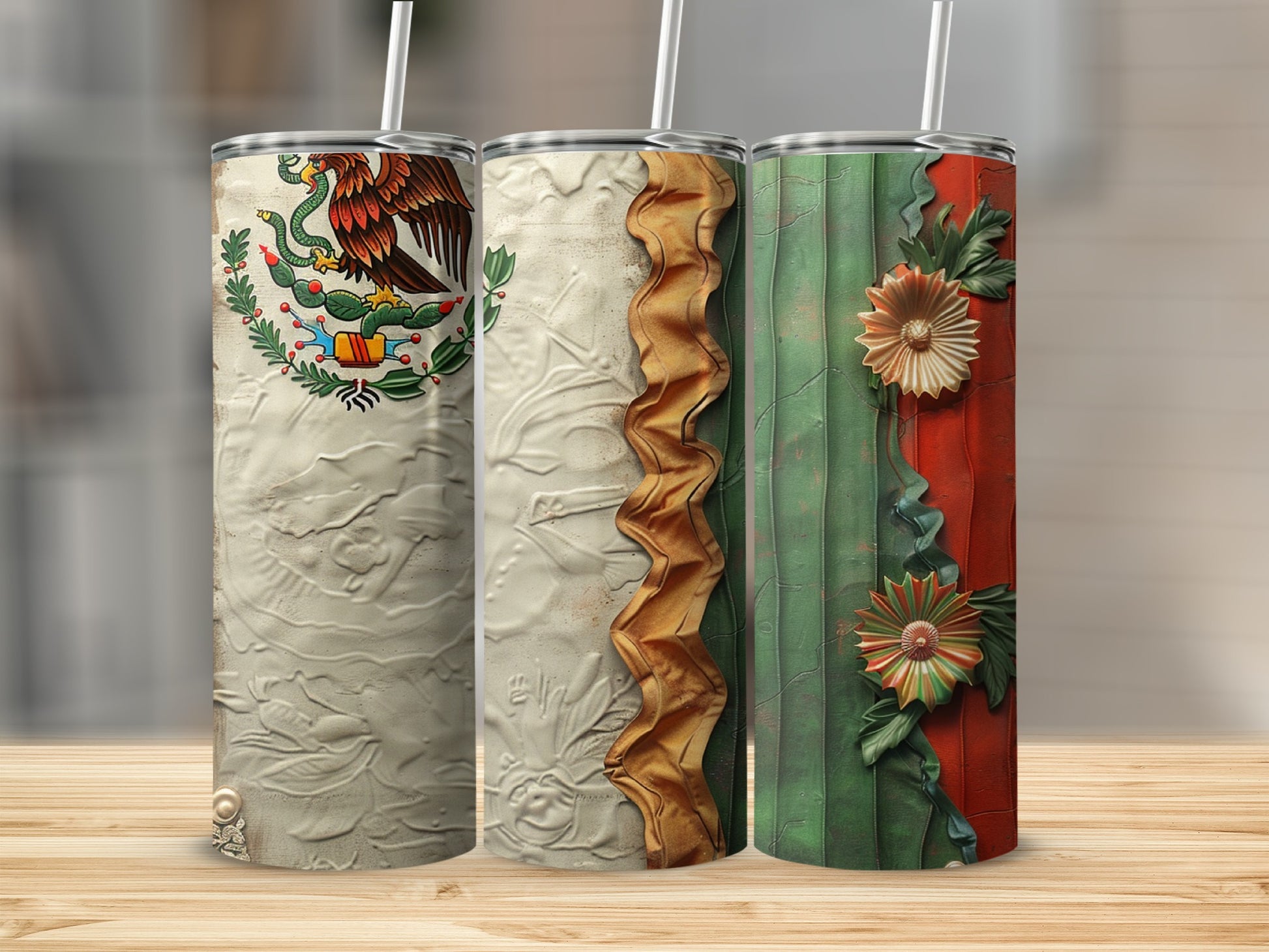 Three decorative tumblers with embossed textures and colorful designs.