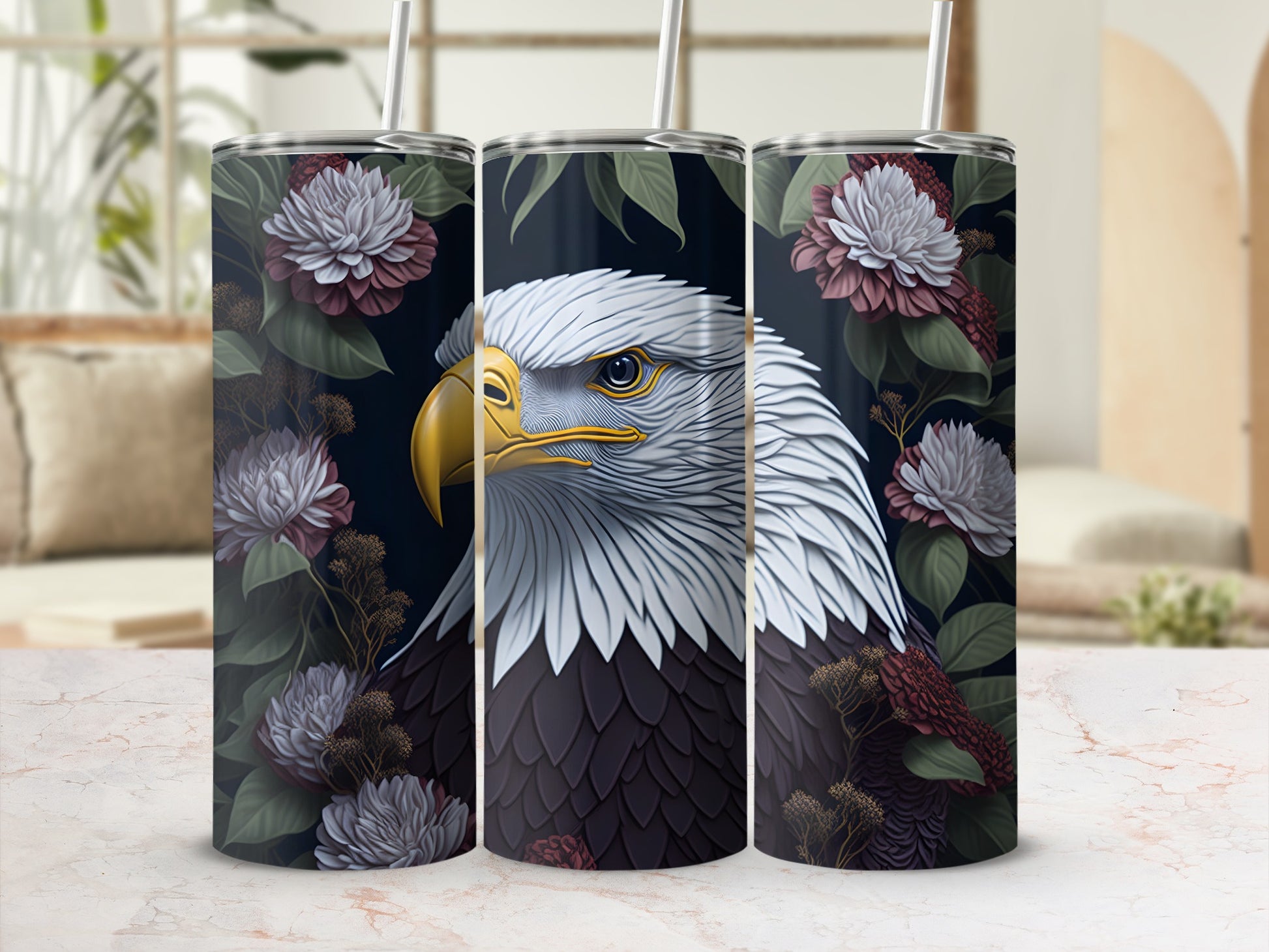 Tumbler with eagle head and floral design.