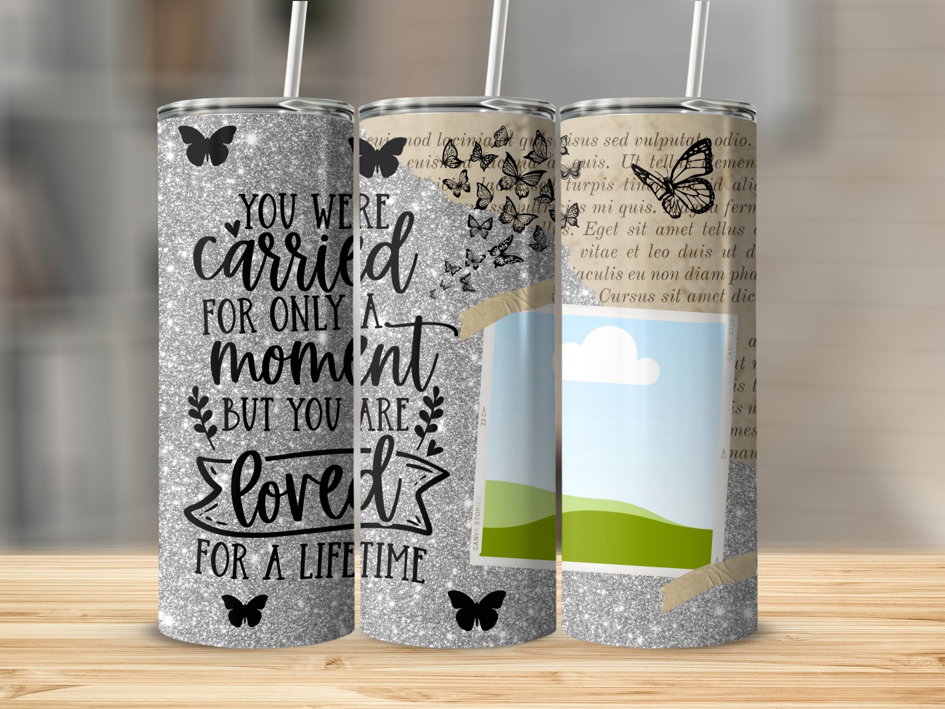 Glitter tumbler with butterflies and text "You were carried for only a moment, but you are loved for a lifetime."