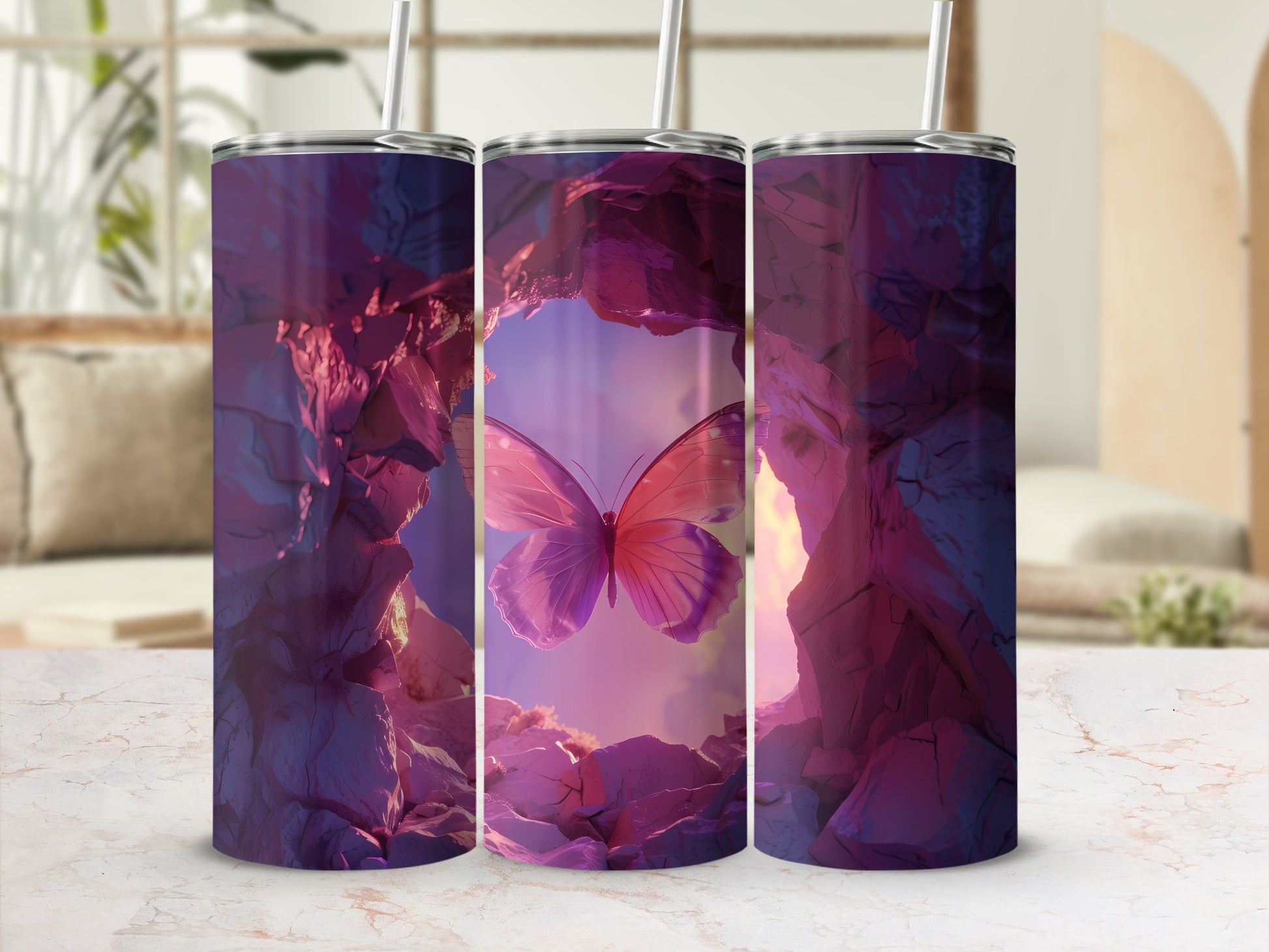 Three tumblers with a pink butterfly in a cave opening design.