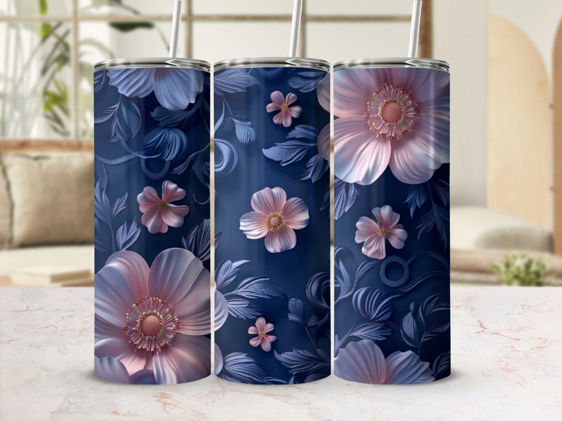 Three tumblers with blue floral embossed pattern, showing pink and purple flowers.