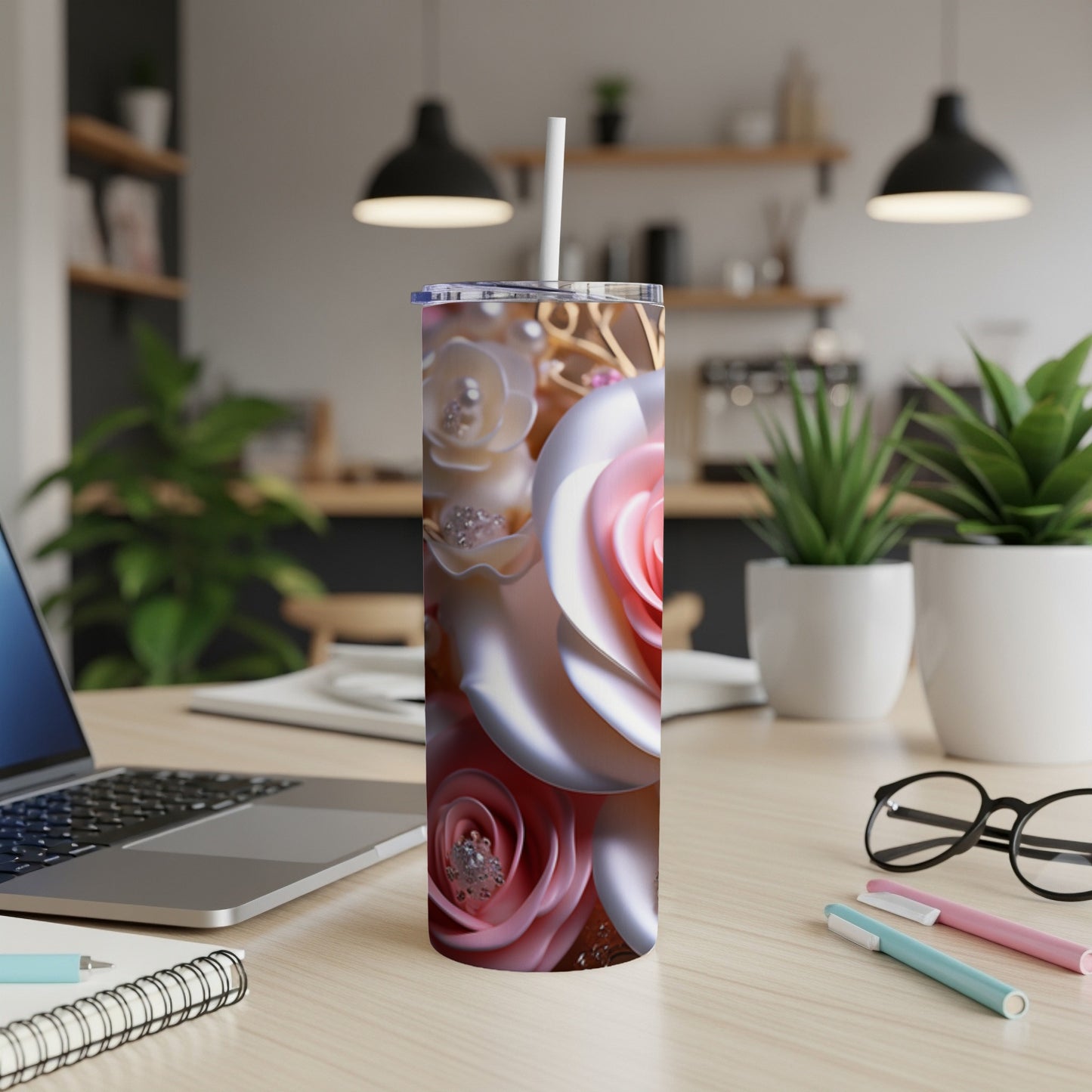 3D pink and white rose design on a skinny tumbler with a white straw.