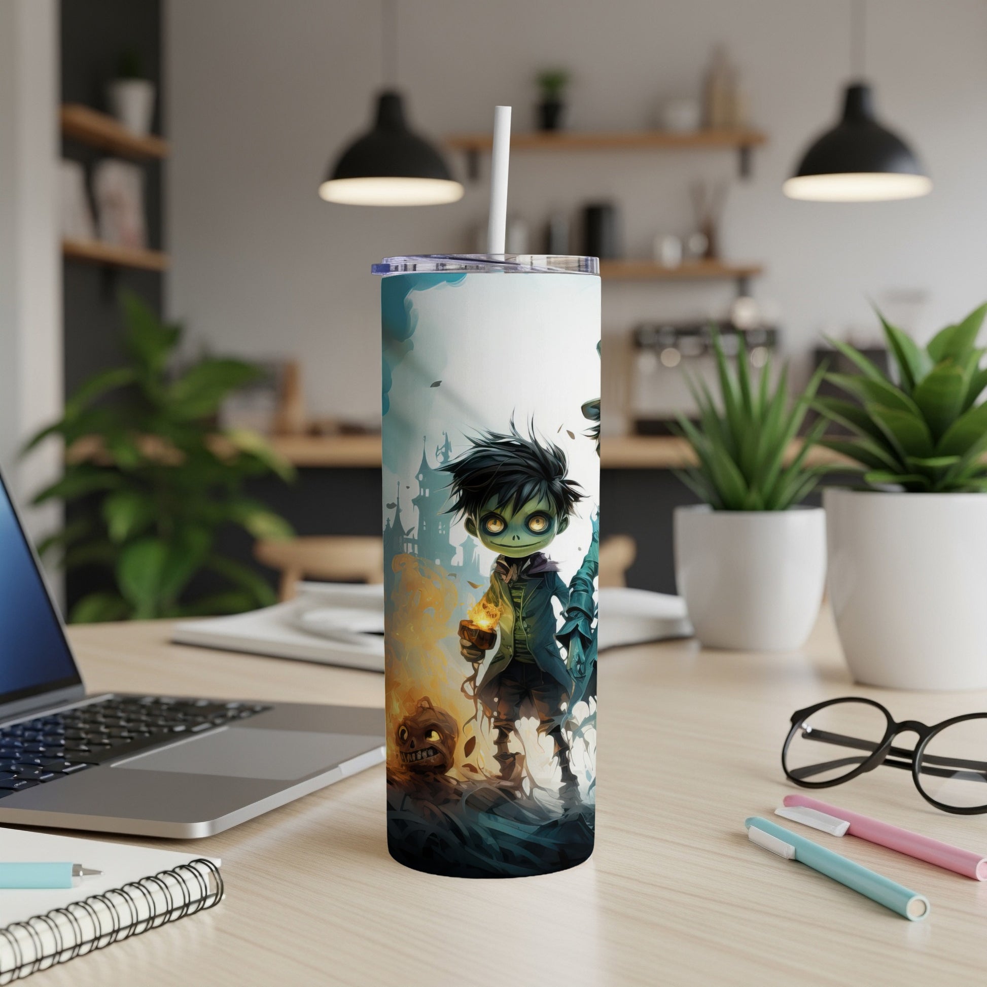 Tall tumbler with cartoon zombie boy and pumpkin illustration, a straw inserted.