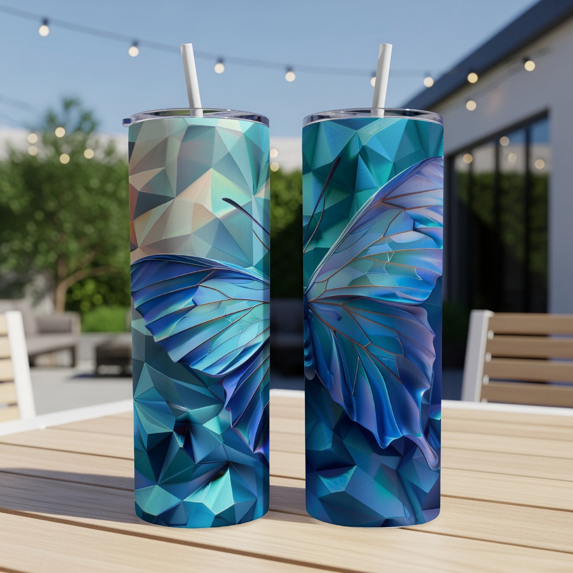 Two tumblers with blue butterfly wings against a geometric, faceted background.