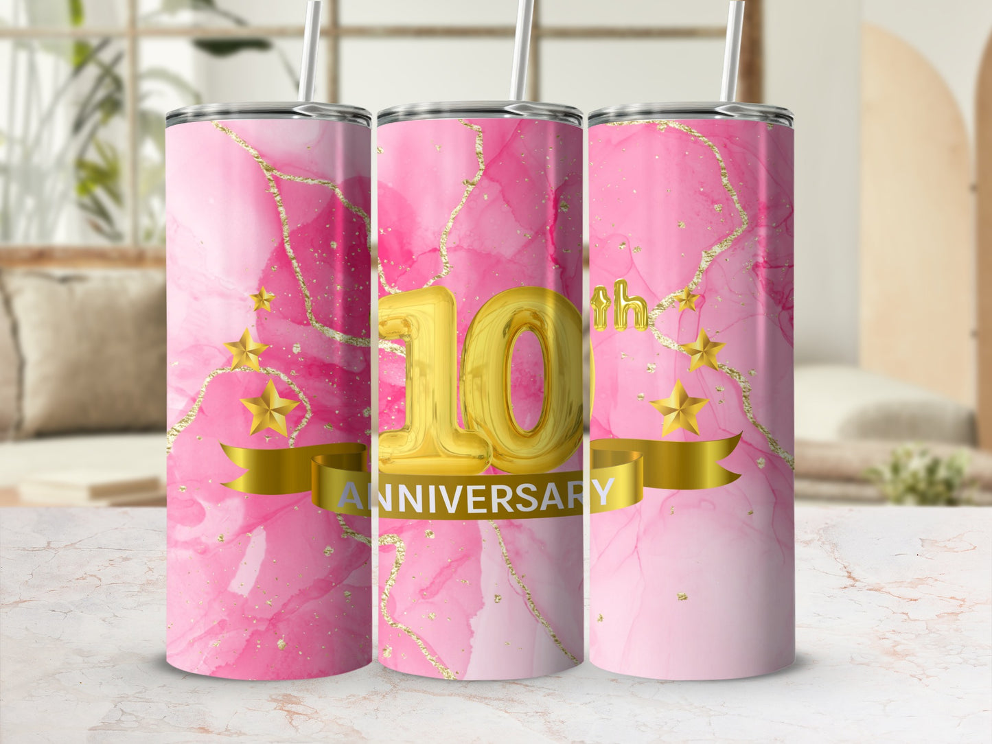 Pink marbled tumbler with "10th Anniversary" and gold stars.