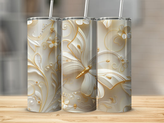 Three tall tumblers with white and gold floral and butterfly embossed designs.