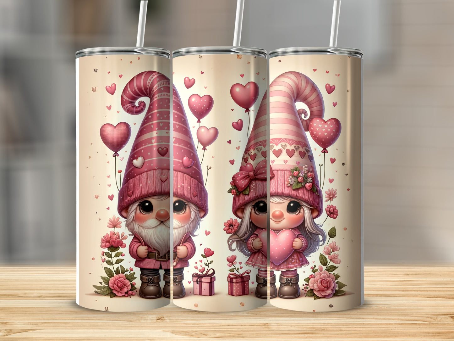 Two gnomes with pink hats and hearts, one holding a gift, on tumblers.