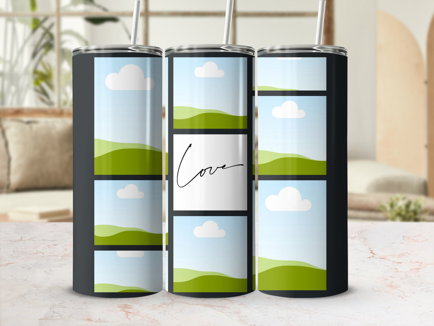 Three tumblers with a collage of green hills, blue skies, and clouds, one central panel reads "Love".