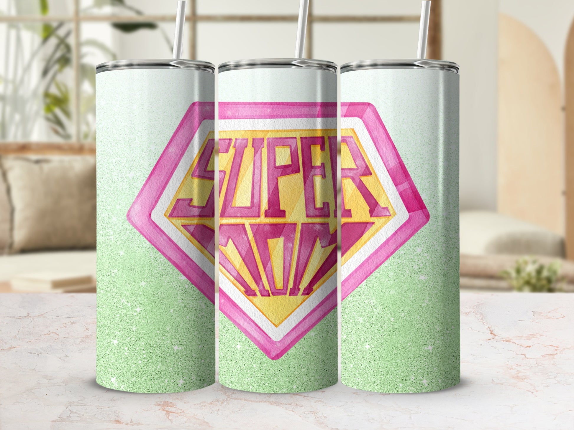 Super Mom tumbler with a glittery green background and pink diamond shape.