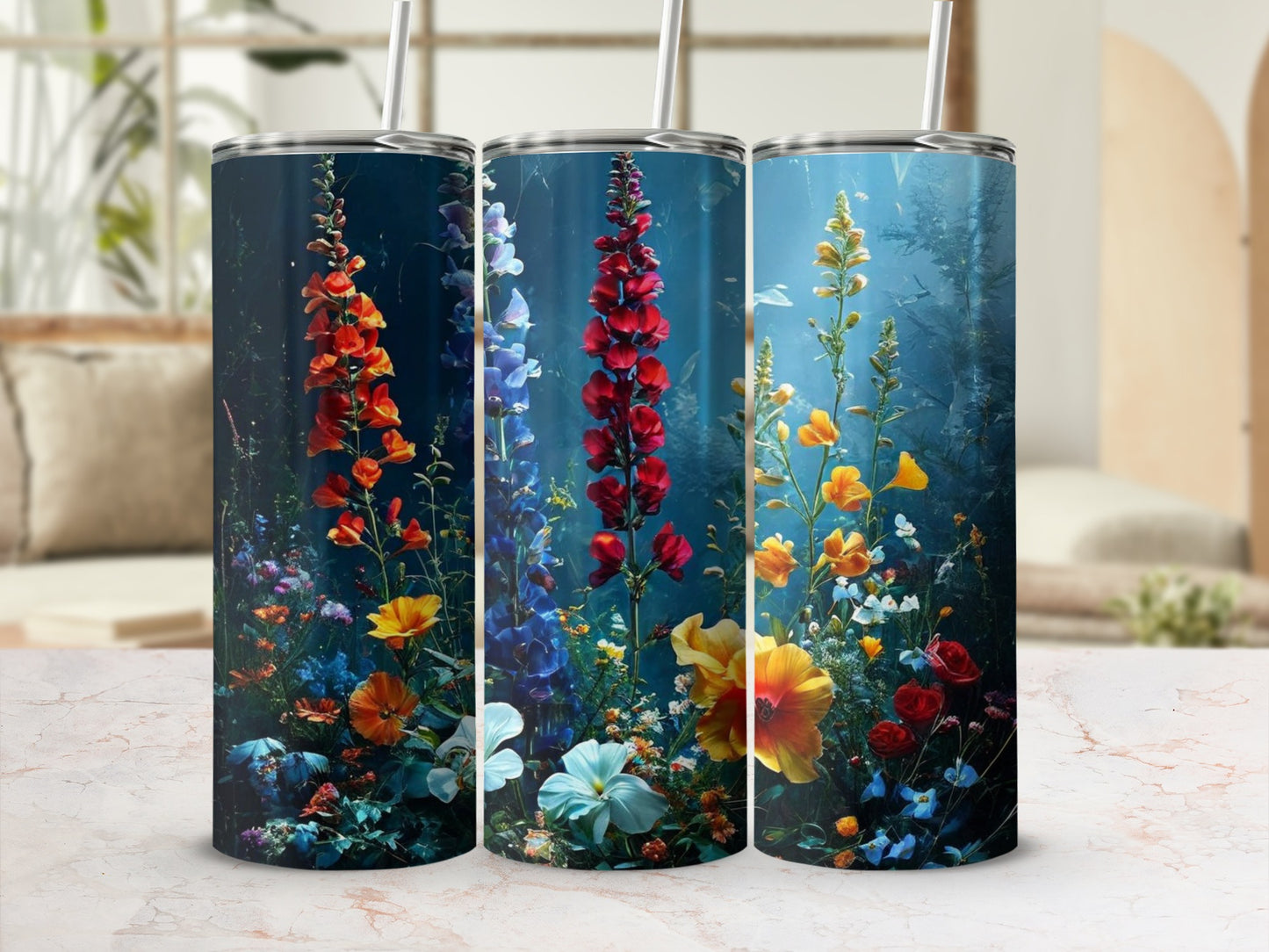 Three tumblers feature colorful floral designs with tall stalks and small blossoms.