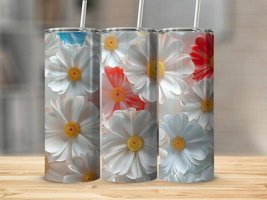 Three tumblers with floral daisy designs in white, pink, and red.