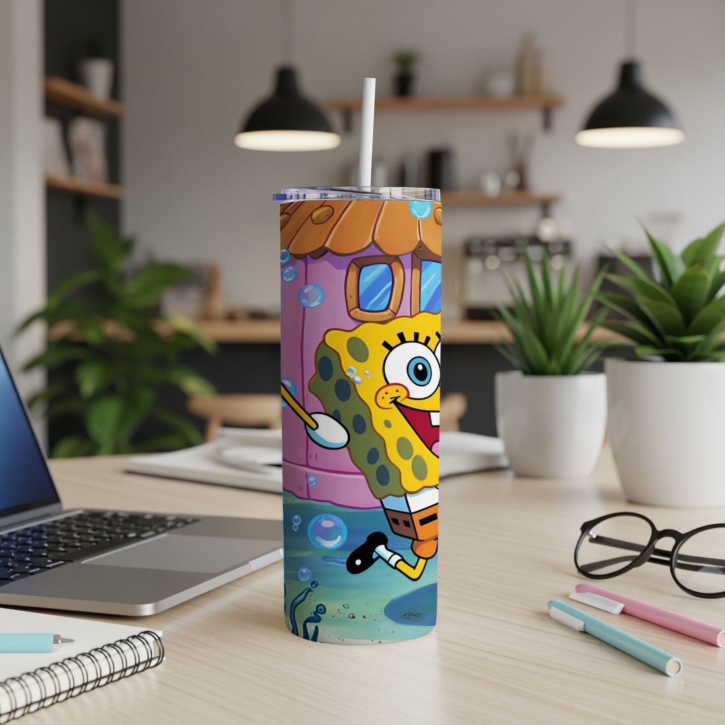 SpongeBob SquarePants character on a pink and purple tumbler cup.