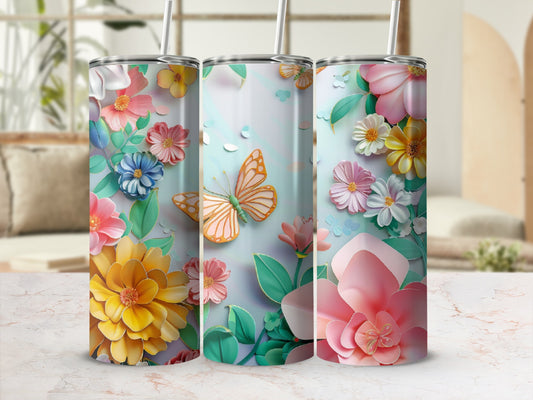 Three tall tumblers with floral patterns and a butterfly design.