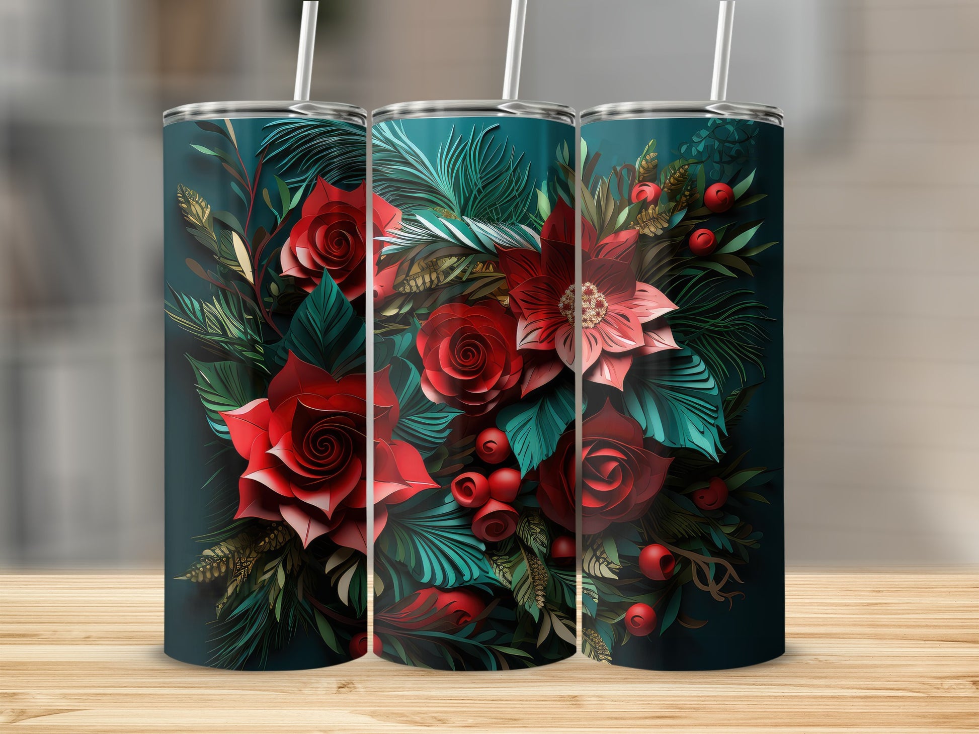 Three tumblers with a floral design of red roses and greenery.