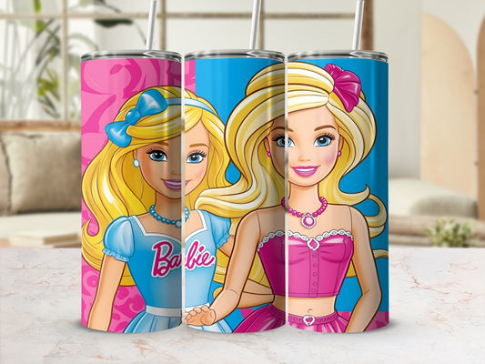 Two Barbie dolls on pink and blue tumblers with straw.