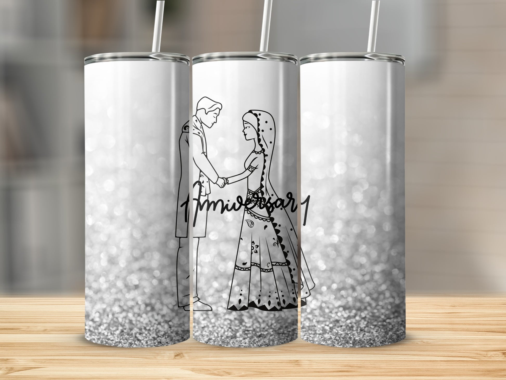 Couple holding hands in wedding attire with "1st Anniversary" text on a glittery tumbler.