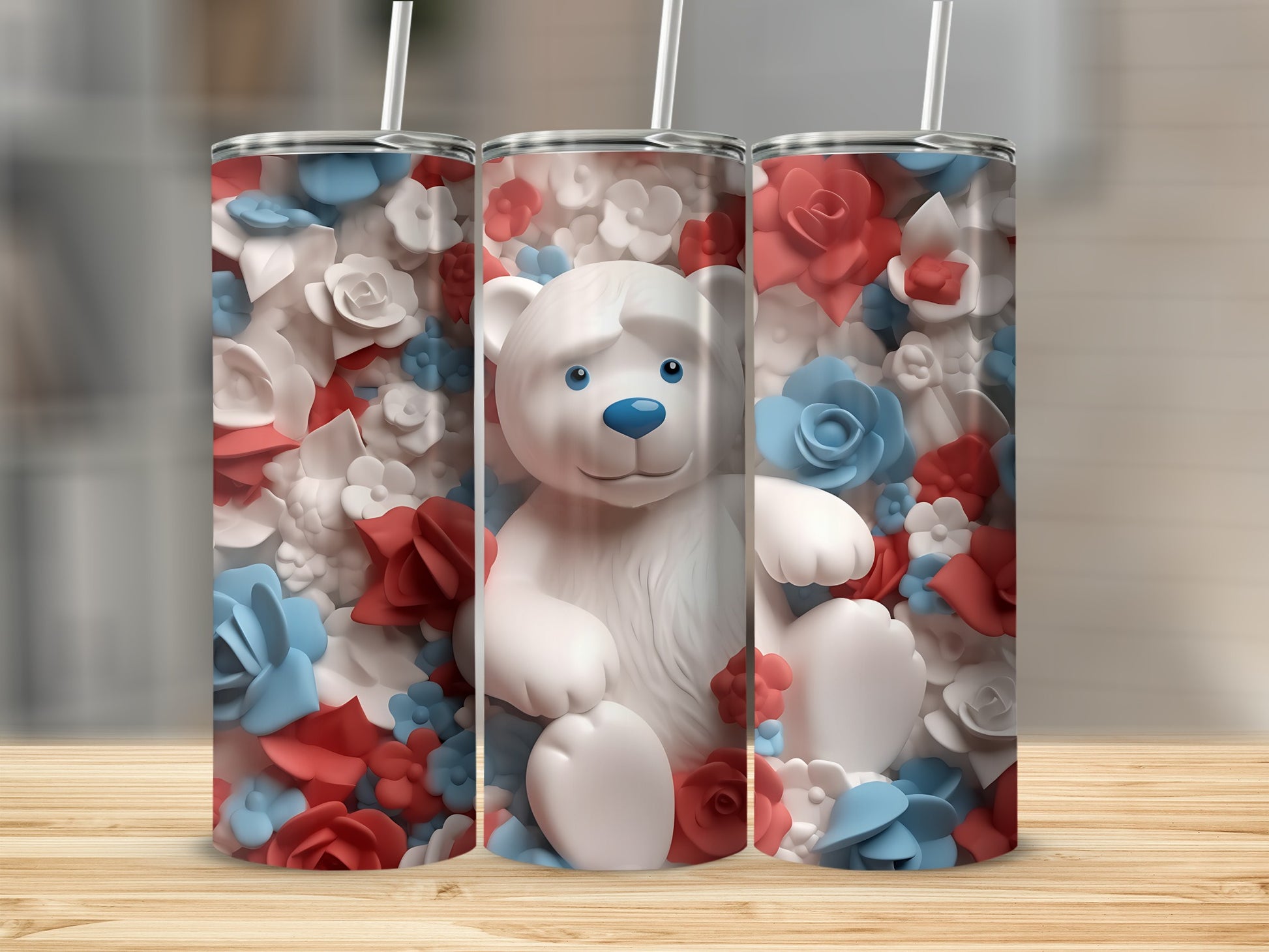 White teddy bear surrounded by red, white, and blue flowers.
