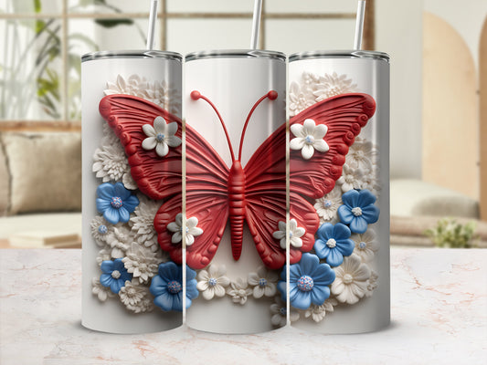 Three white tumblers adorned with red butterfly and floral designs.