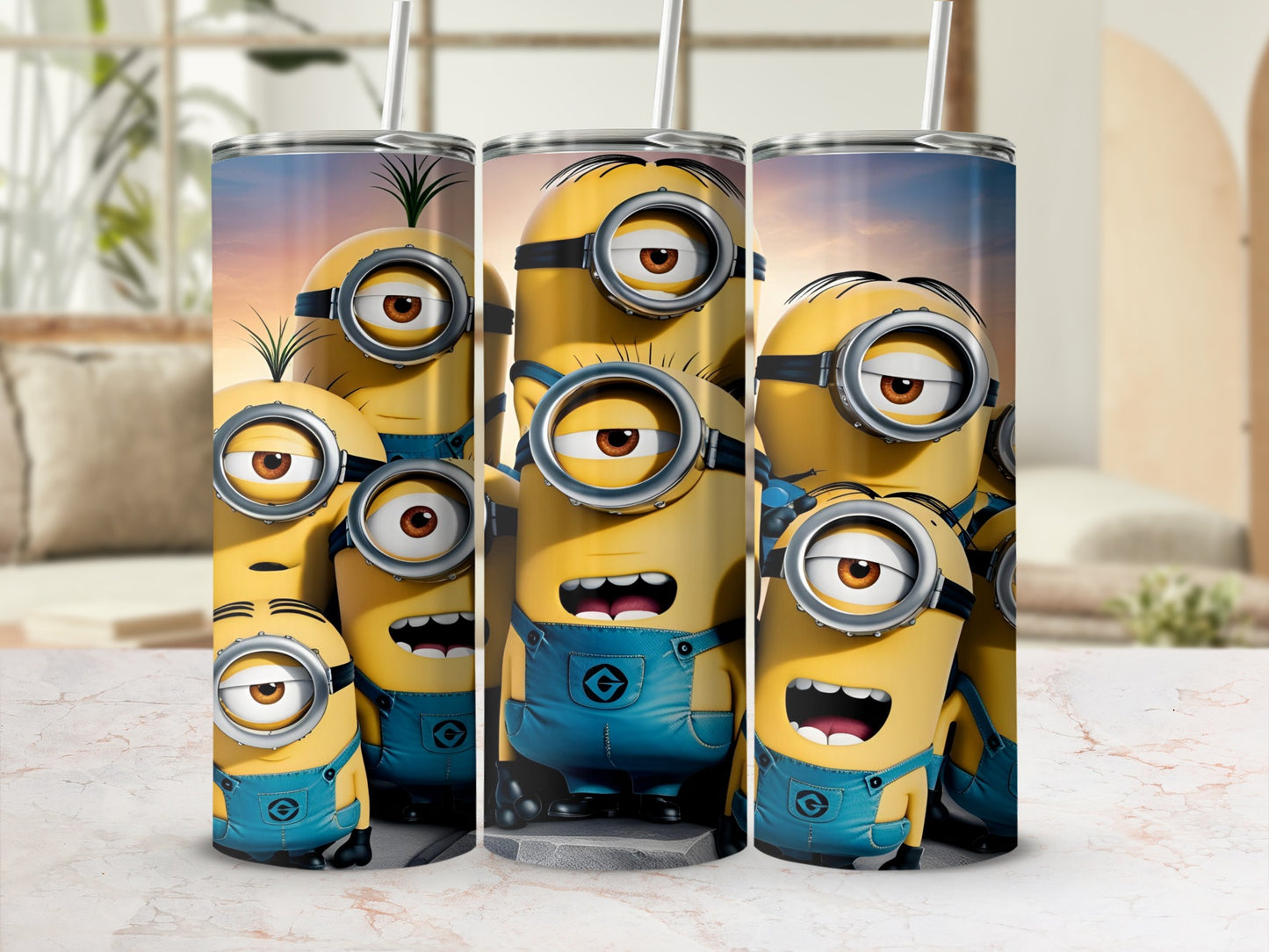 Minions wearing blue overalls on a tumbler with a straw.