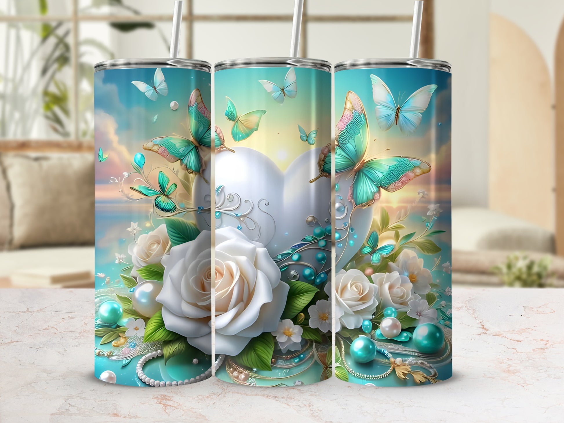 Three tumblers with butterflies, roses, pearls, and floral accents on a light background.