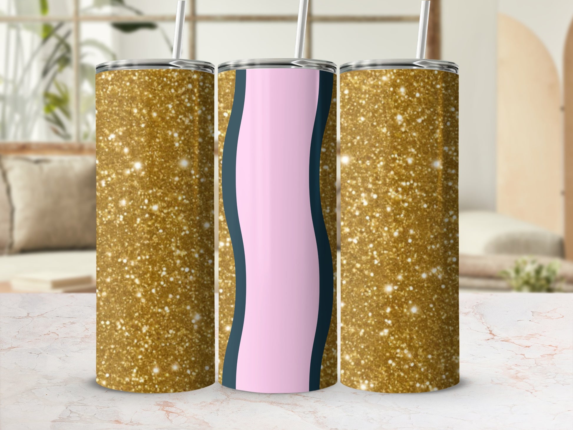 Three glitter-covered tumblers with a pink and navy stripe design.