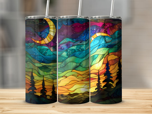 Three tumblers with stained glass moon, sun, and starry night forest designs.