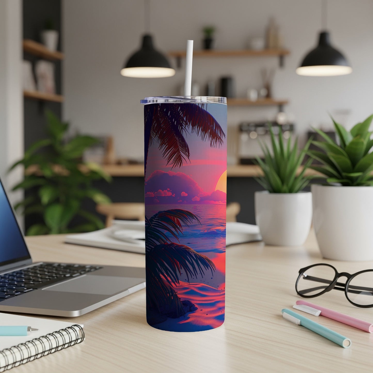 Beach sunset scene on a skinny tumbler with straw.