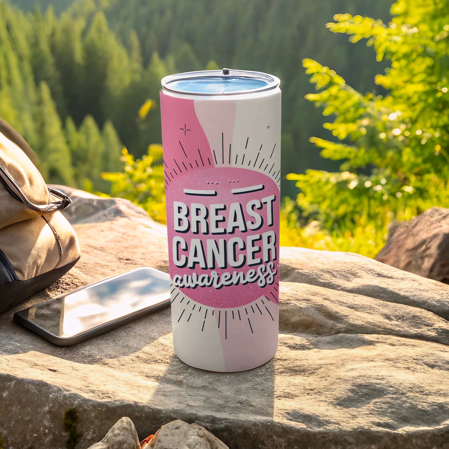 White tumbler with "Breast Cancer Awareness" in pink text and sunburst design.