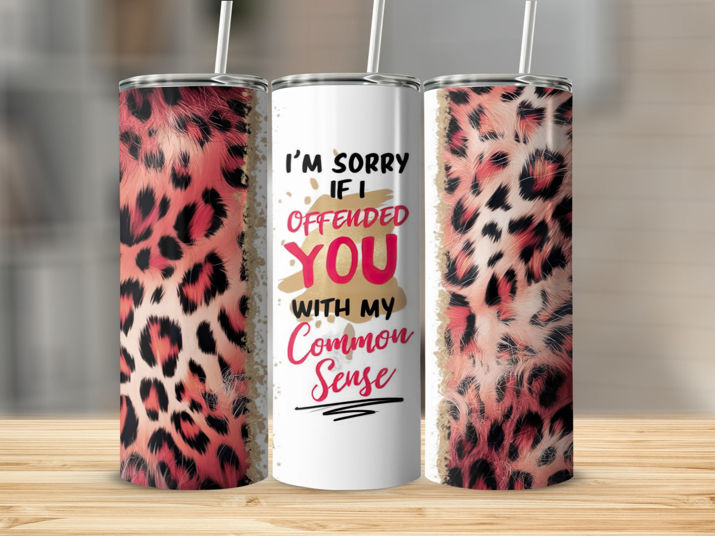 White tumbler with leopard print and "I'm sorry if I offended you with my Common Sense" text.