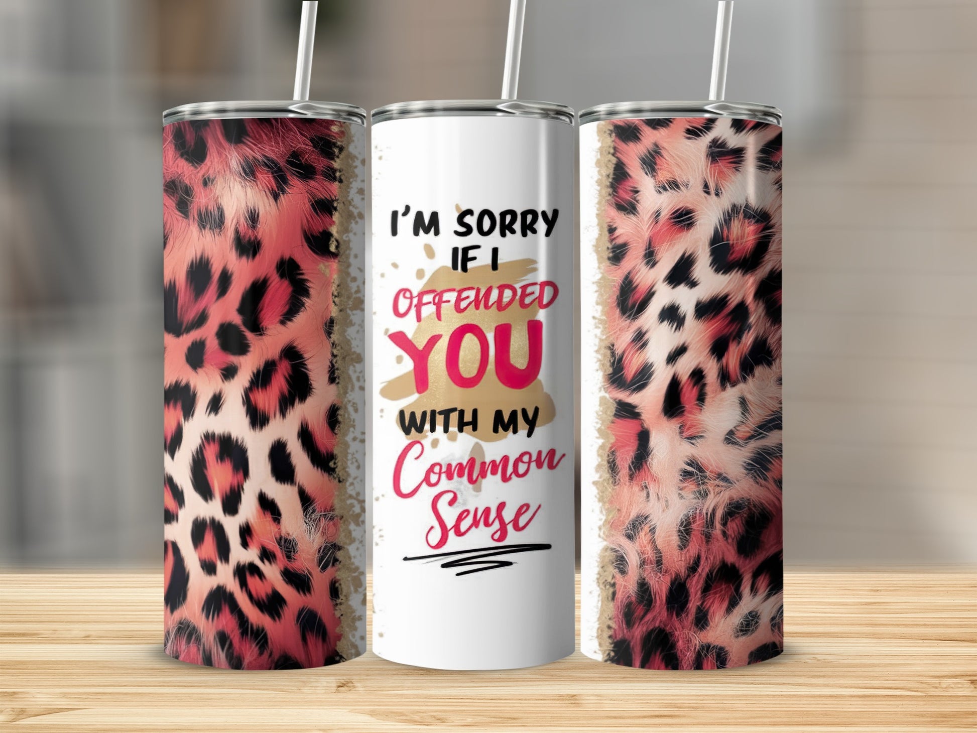 White tumbler with leopard print and "I'm sorry if I offended you with my Common Sense" text.