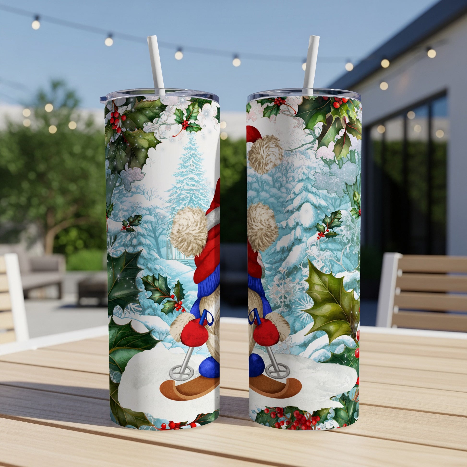 Two skinny tumblers with a Santa gnome and snowy forest Christmas design.