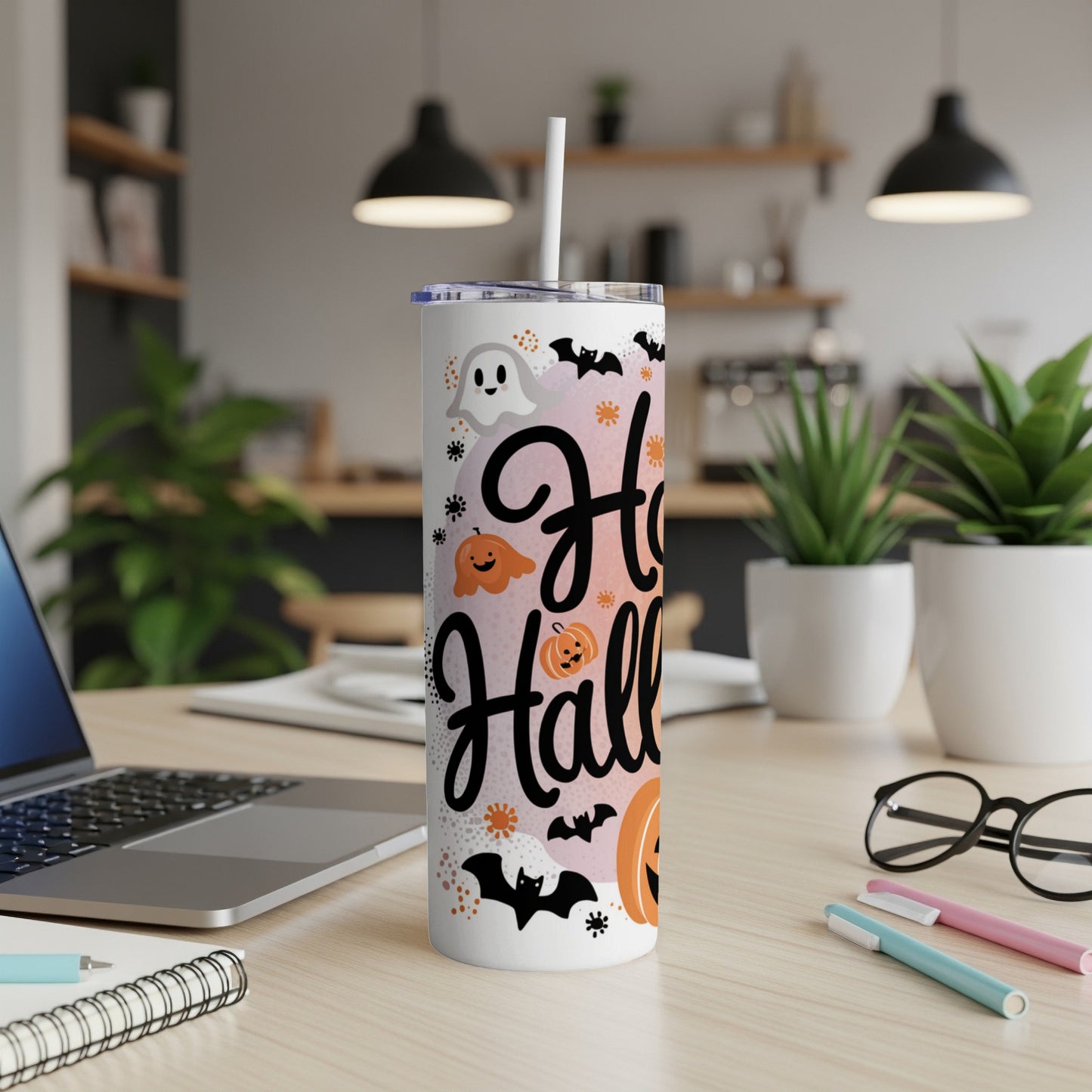Halloween tumbler with ghost, bats, and pumpkins, reading "Happy Halloween".
