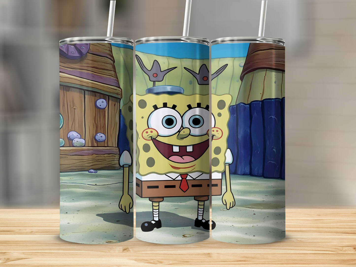 SpongeBob SquarePants character on a tumbler with a sandy background.