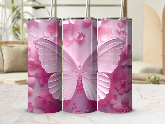 Pink butterfly and floral patterned tumbler with straw.