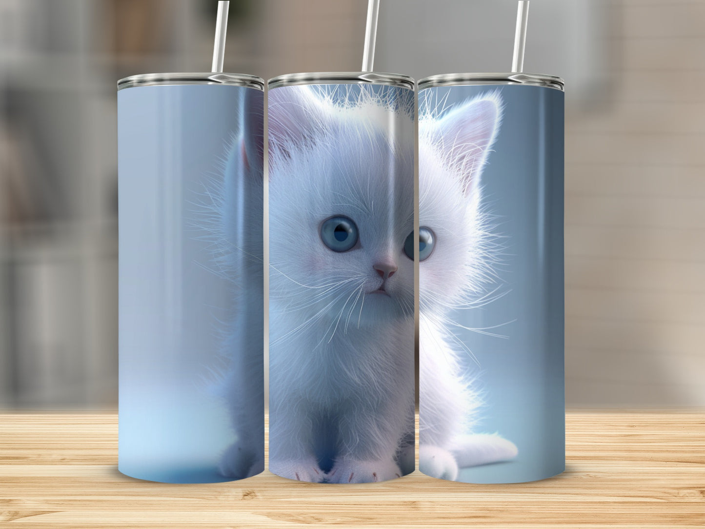 White kitten with blue eyes on a blue background, presented on a tumbler.