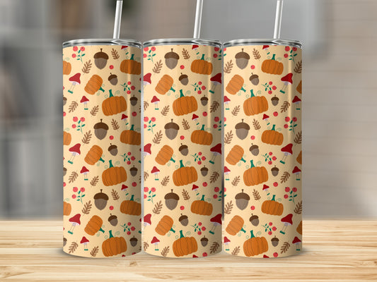 Three tumblers with a fall harvest pattern of pumpkins, acorns, and mushrooms.