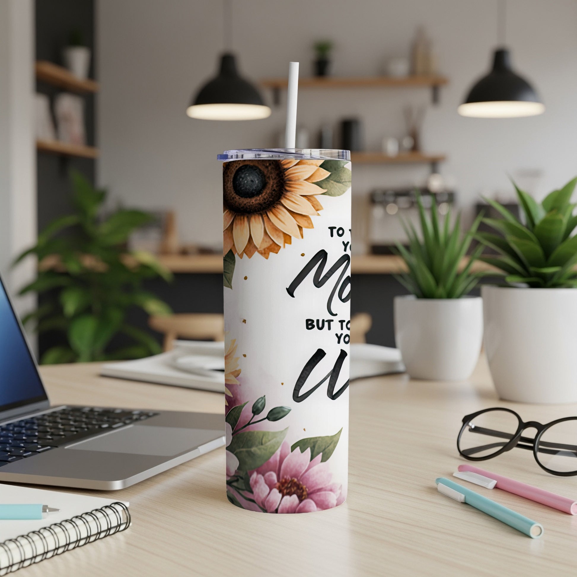 White tumbler with sunflowers, pink flowers, and text "To my Mom..."