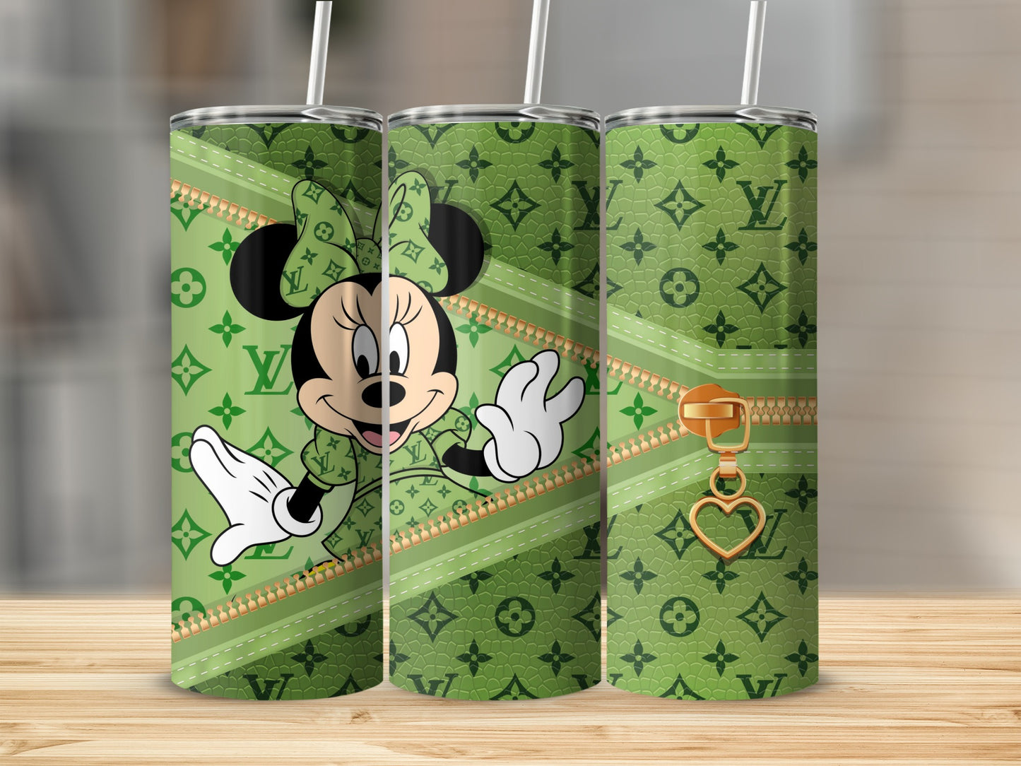 Green tumbler with Minnie Mouse and LV-inspired pattern.