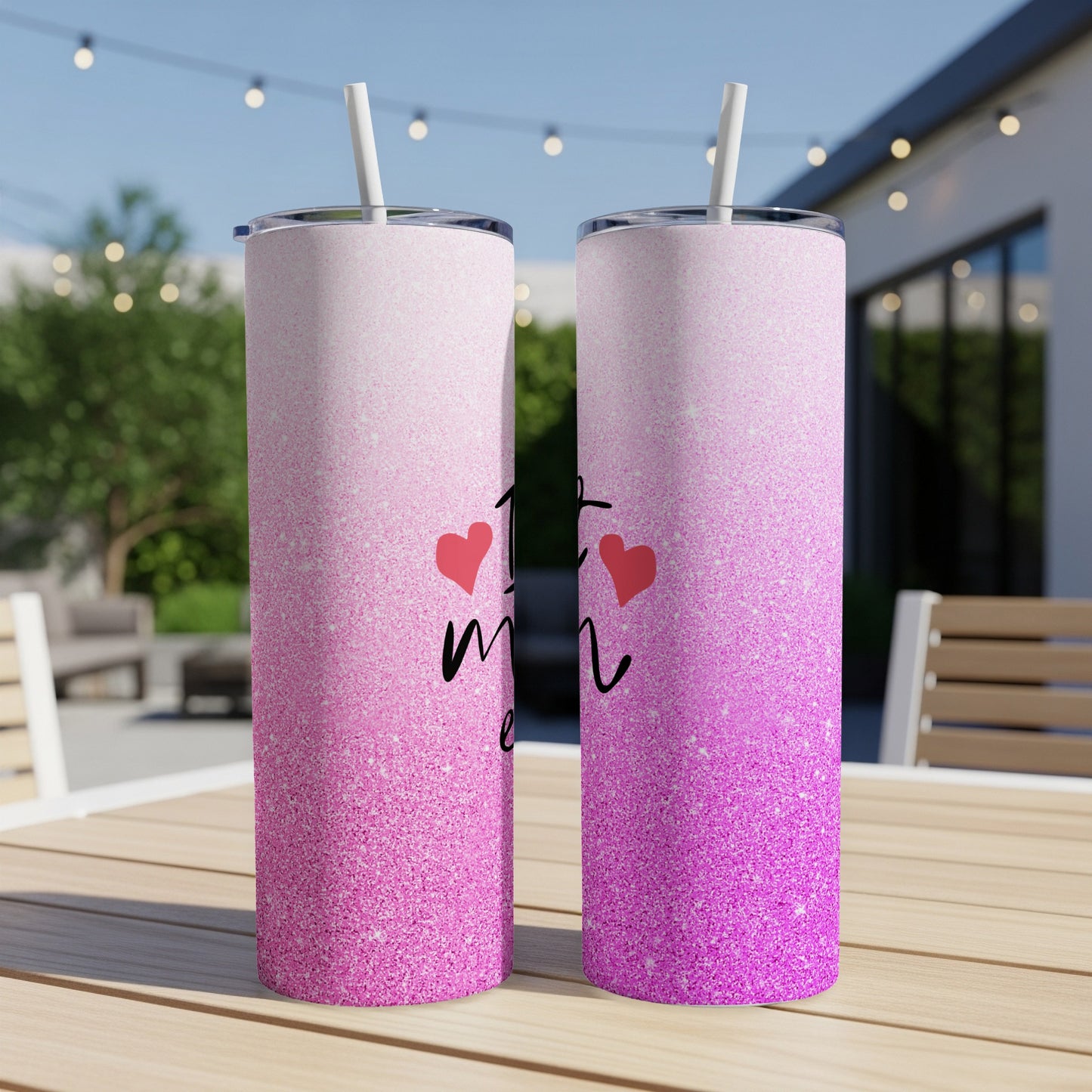 Pink gradient tumbler with "Mom" and two heart designs.
