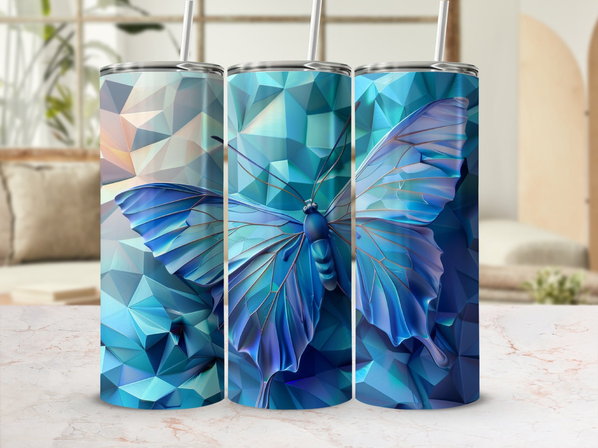 Three tumblers featuring a blue butterfly on a geometric, crystalline background.