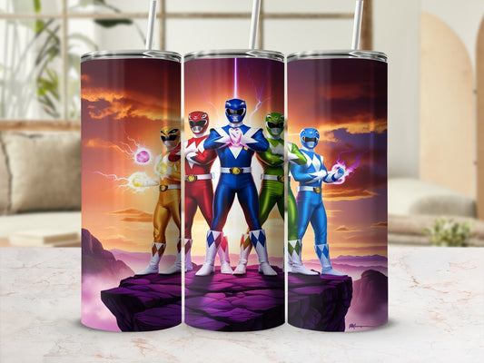 Five Power Rangers in a line, standing on rocky terrain.