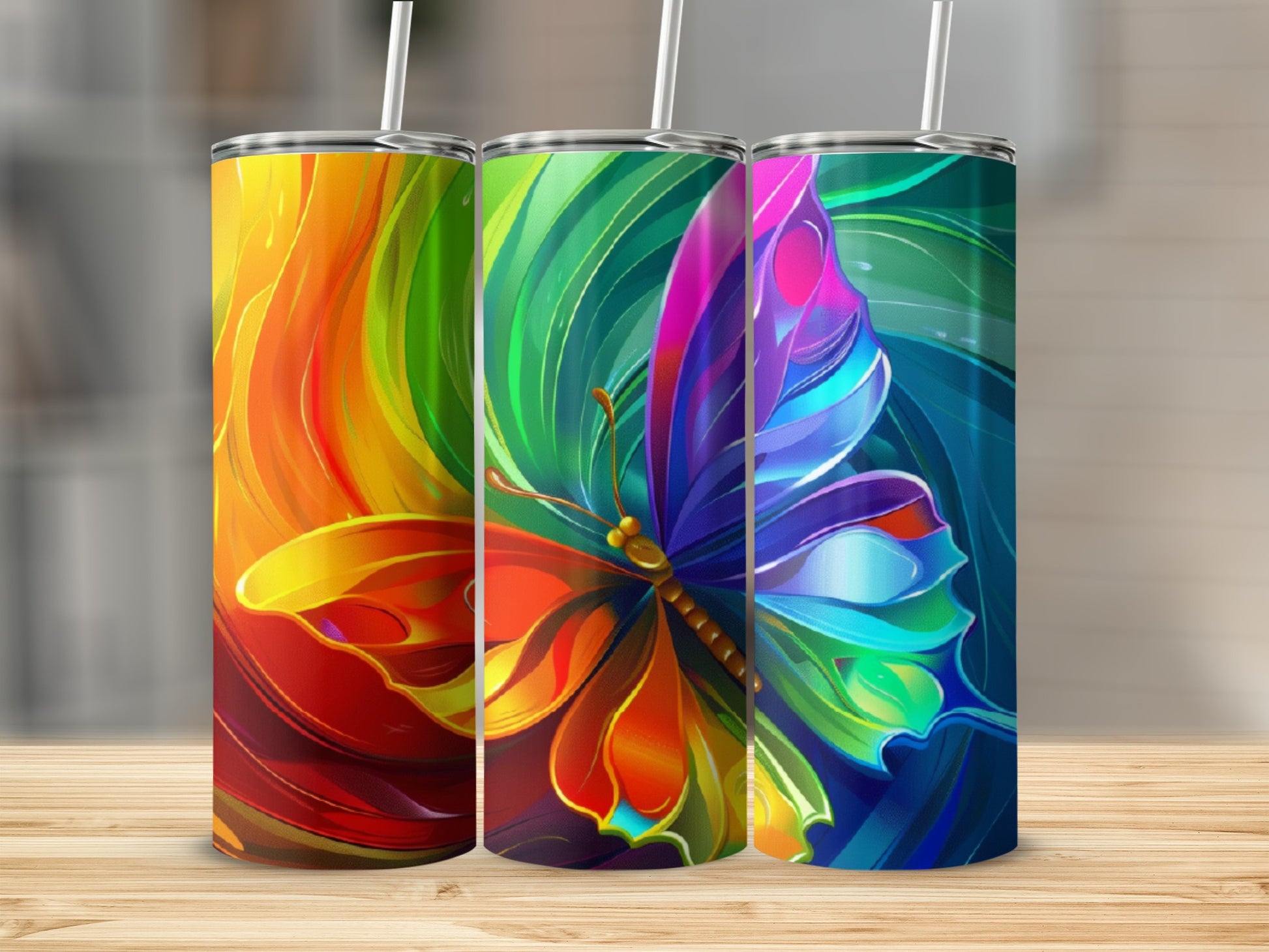 Three tall tumblers with colorful stained-glass butterfly designs.