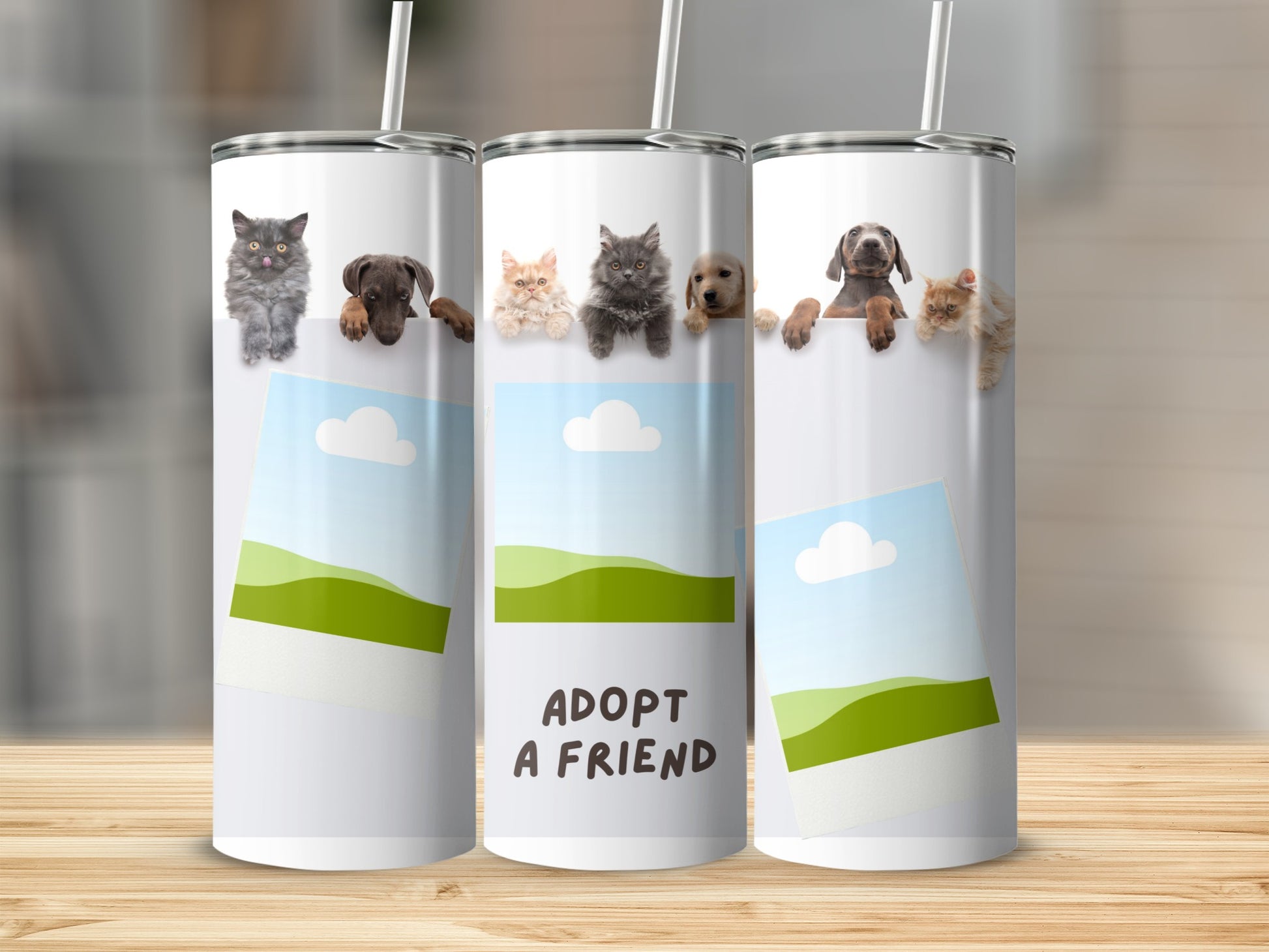 Three tumblers with images of cats and dogs peeking over the top and "ADOPT A FRIEND" text.