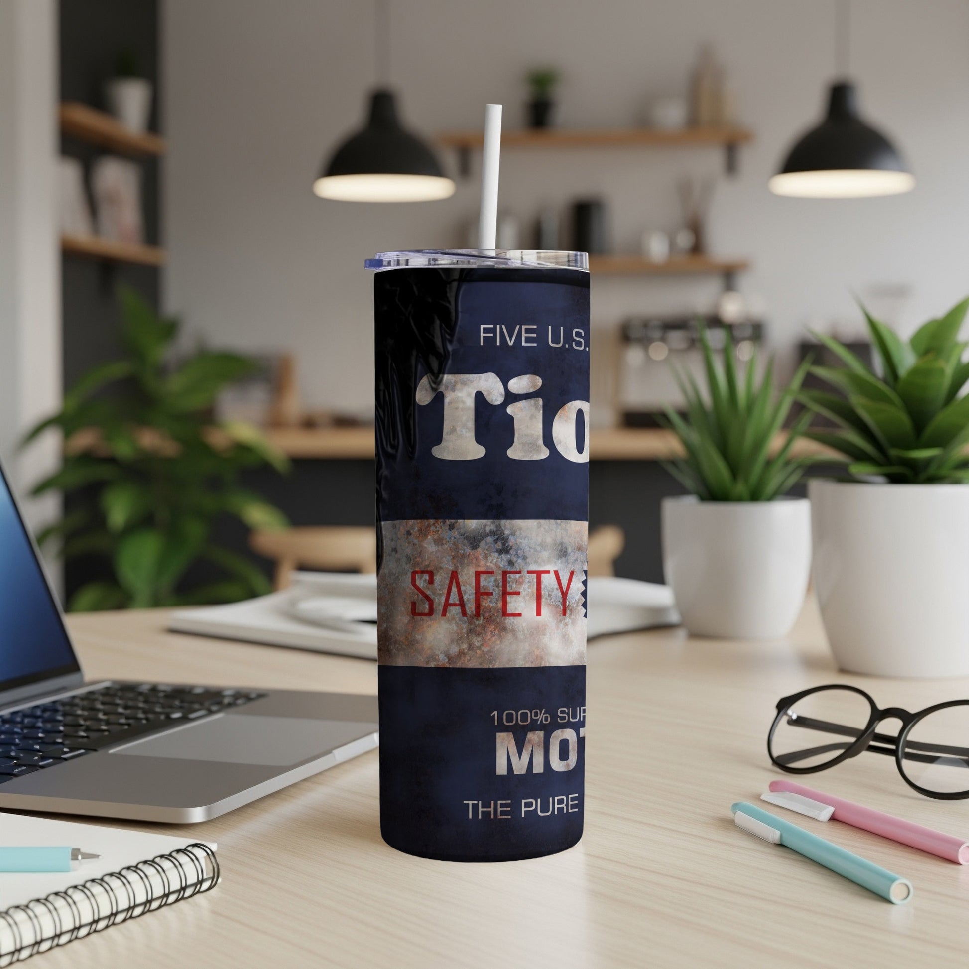 Dark blue tumbler with "SAFETY", "Tiq", and "100% SUPERIOR MOTORS" text.