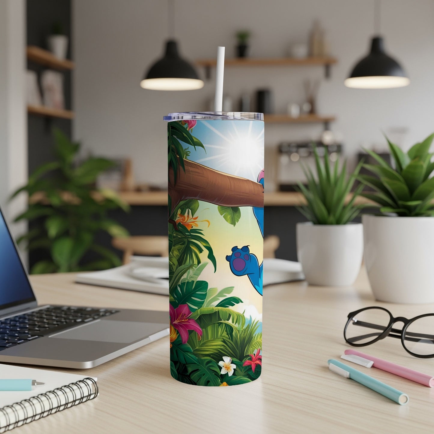 Stitch character on a tropical leaf patterned tumbler with a white straw.