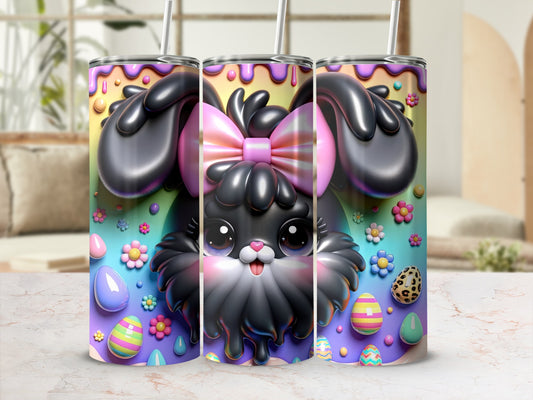 Black bunny with pink bow and colorful Easter eggs on a tumbler.