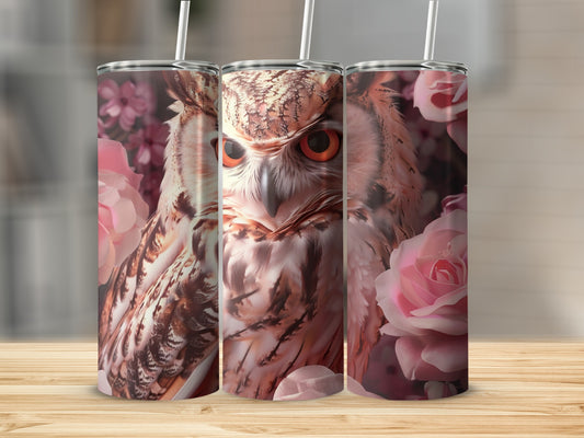Close-up of a detailed owl face with pink roses on a tumbler.